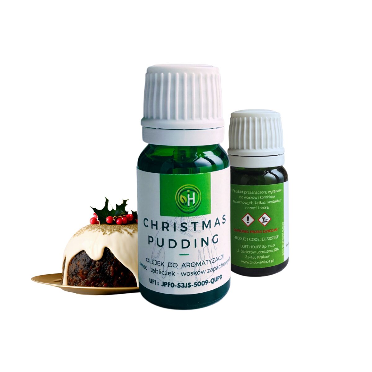 Olejek do wosków sojowych o zapachy Christmas Pudding a co za tym idzie idealny również do świec, wosków zapachowych do kominka , tabliczek zapachowych. W zielonej szklanej butelce z białą zakrętką na białym stole