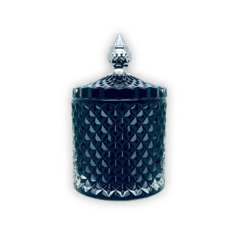 Pojemnik wraz z zakrętką do zalewu świec stojący na stole kolor czarny mat połysk